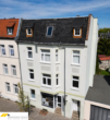 Städtisches Wohn- und Geschäftshaus / Mehrfamilienhaus - Bild