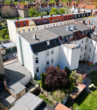 Städtisches Wohn- und Geschäftshaus / Mehrfamilienhaus - Bild