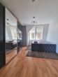Charmante 2-Raum-Wohnung mit herrlichem Ausblick auf Schloss und Saale - Schlafzimmer
